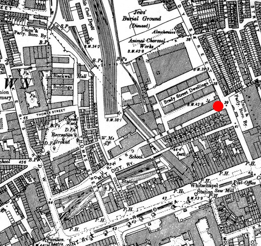 Ordnance Survey map published 1894, detail around Buck's Row (shown under its later name, Durward Street) and Brady Street. The red dot was added in 2009 by a Wikimedia Commons contributor to mark the murder site; its placement is approximate and is not evidence for the exact spot.